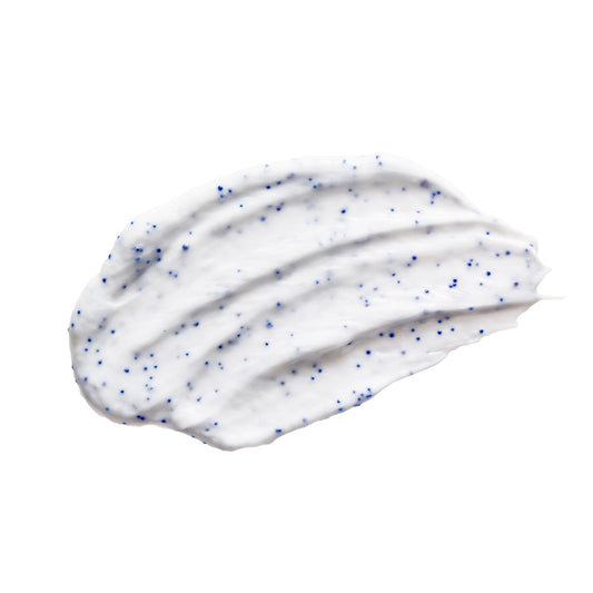 Sunflower face scrub with natural exfoliation showing a creamy texture with blue exfoliating beads.